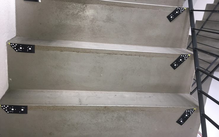 Coded targets laid out in pairs at the ends of every step